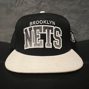 ‘12 MITCHELL & NESS Brooklyn Nets Ombre Arch Text Adjustable SnapBack Hat